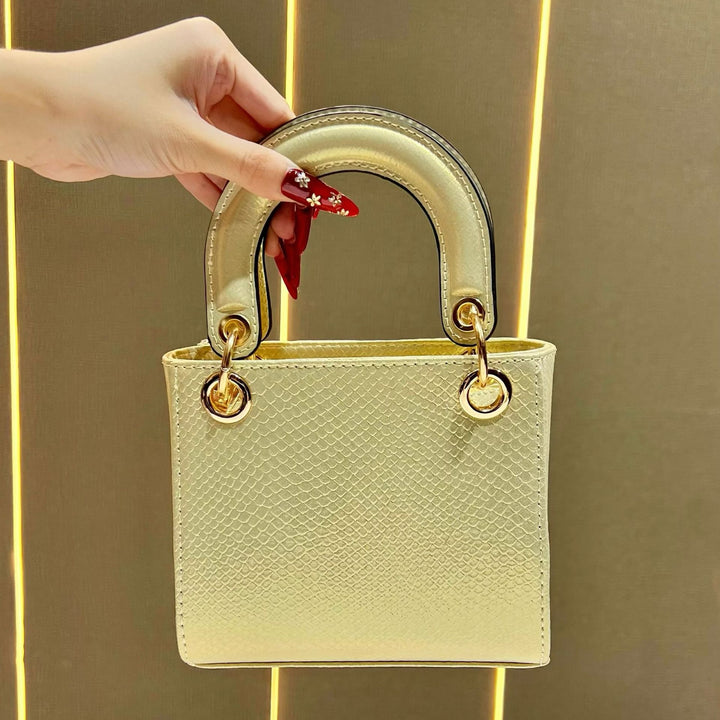Stylische Schlangenleder-texturierte Handtasche