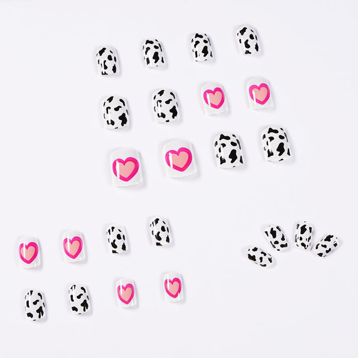 Kreative Nagelkunst mit Herz- und Tiermustermotiv Karnz