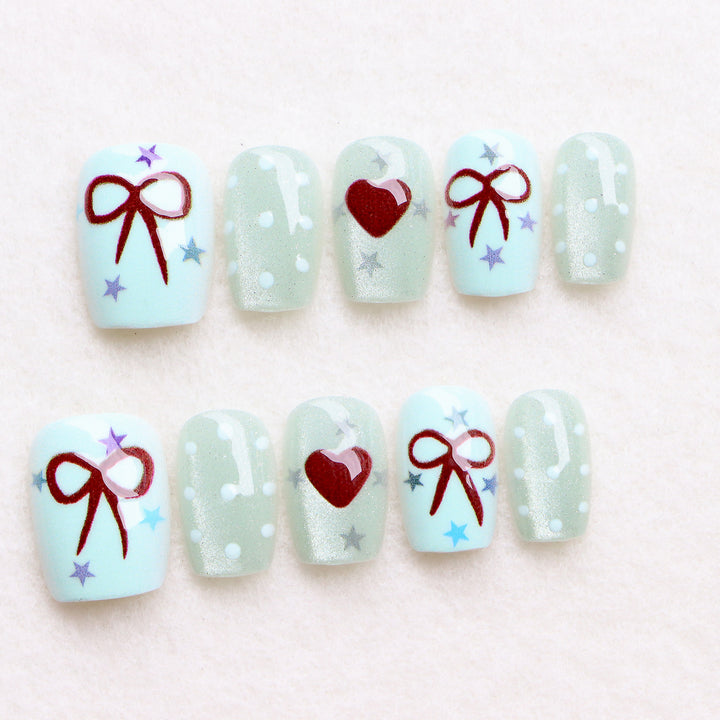 Dekoratives, urlaubsbezogenes Press-On-Nagelkunst-Set Karnz