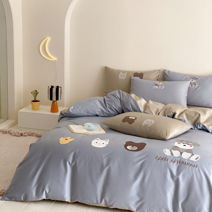 Verspielter Tierdruck Wendbare Baumwollsatin Bettbezug und Kissenbezug Set