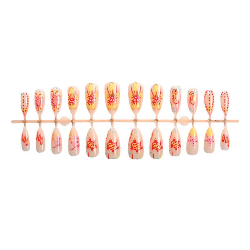 Künstlerisches Press-On-Nagelset mit floralen und bunten Designs Karnz
