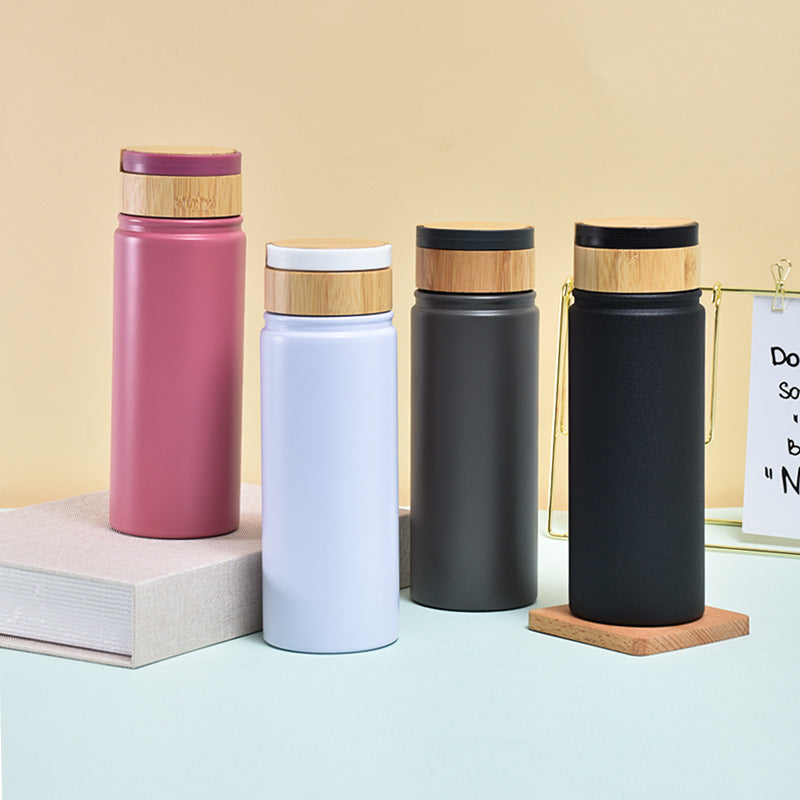 Damen stilvolle und vielseitige Edelstahl Trinkflasche mit Bambusverschluss Karnz
