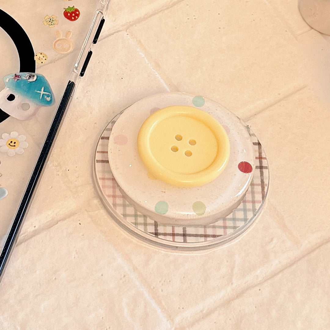 Dekorativer Untersetzer im Button-Design Karnz