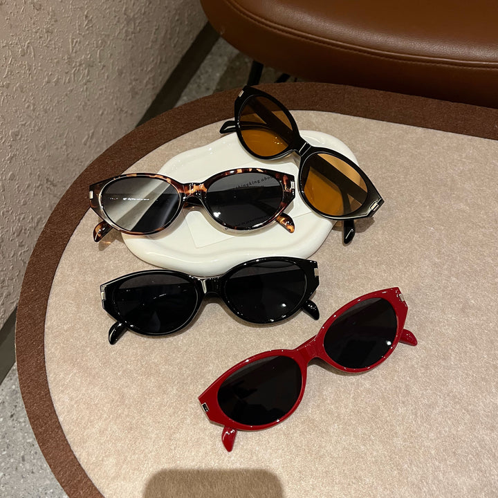 Stylische Katzenaugen-Sonnenbrillen mit einzigartigem Muster Karnz