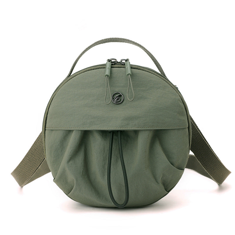 Runde Crossbody-Tasche Karnz