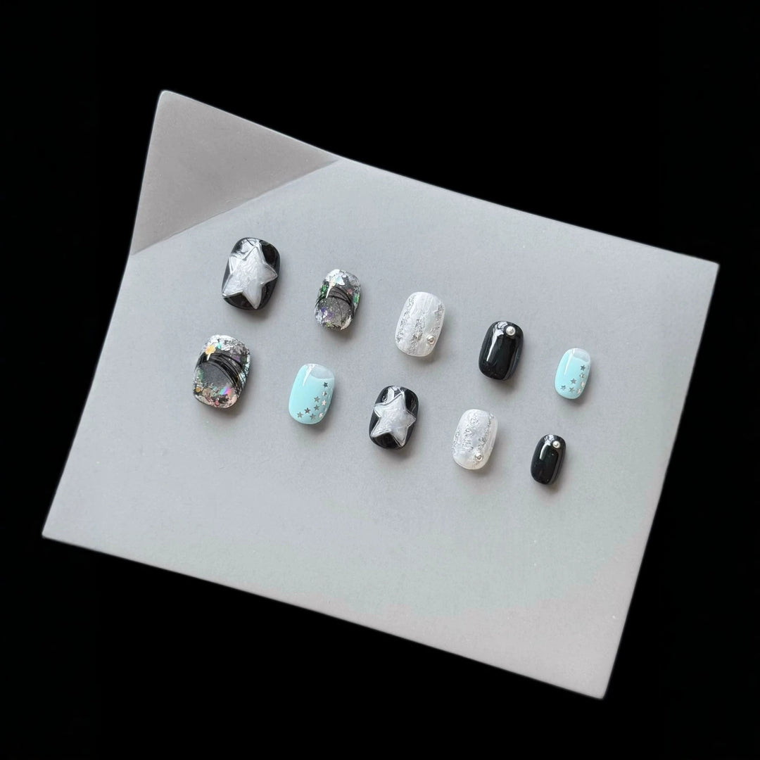 Dekoratives Press-On Nagelkunst-Set mit kosmischem Stern-Thema