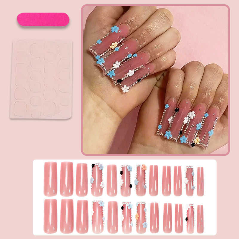 Künstliche Nagelkunstset mit floralen Verzierungen und Glitzerakzenten Karnz
