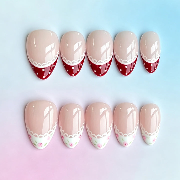Künstlerische Press-On Nagelset mit Vintage-Blumen- und Punktedesign Karnz