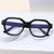 Damen modische oversized Brille mit charakteristischem Rahmen Karnz