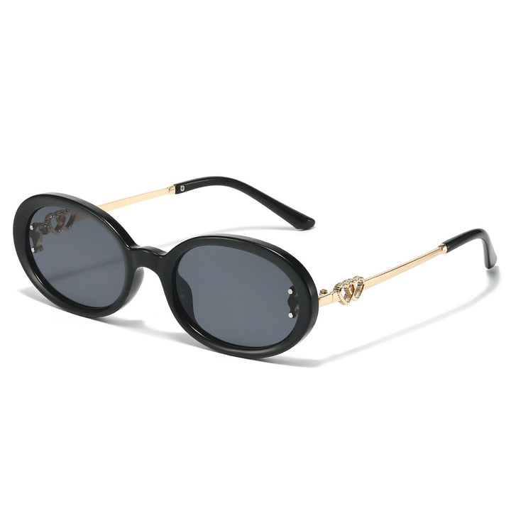 Elegante Shield Sonnenbrille mit dekorativen Metalldetails Karnz