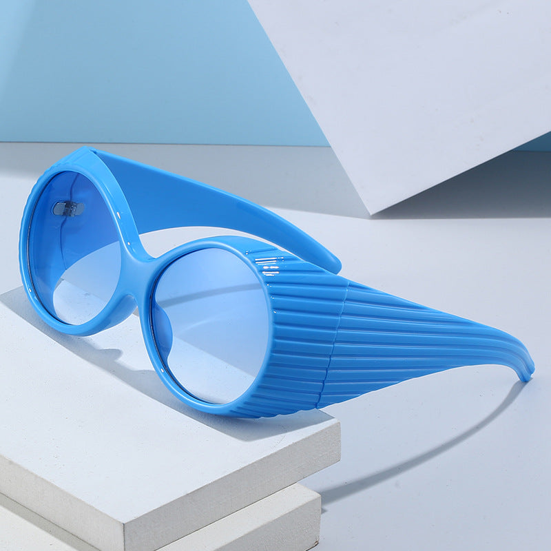 Damen Extravagante Sonnenbrille mit einzigartigem Wellendesign Karnz