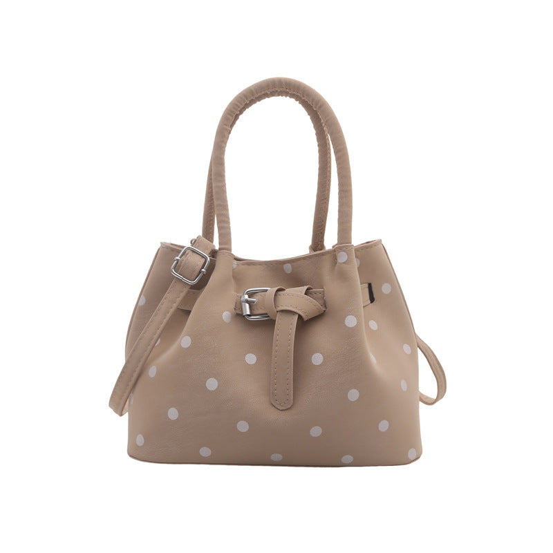Legere Wildleder-Punktedot-Handtasche