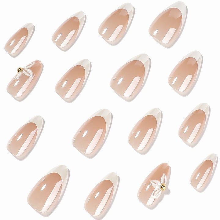 Kunstvolle Stiletto-Nägel mit elegantem Blumendesign Karnz