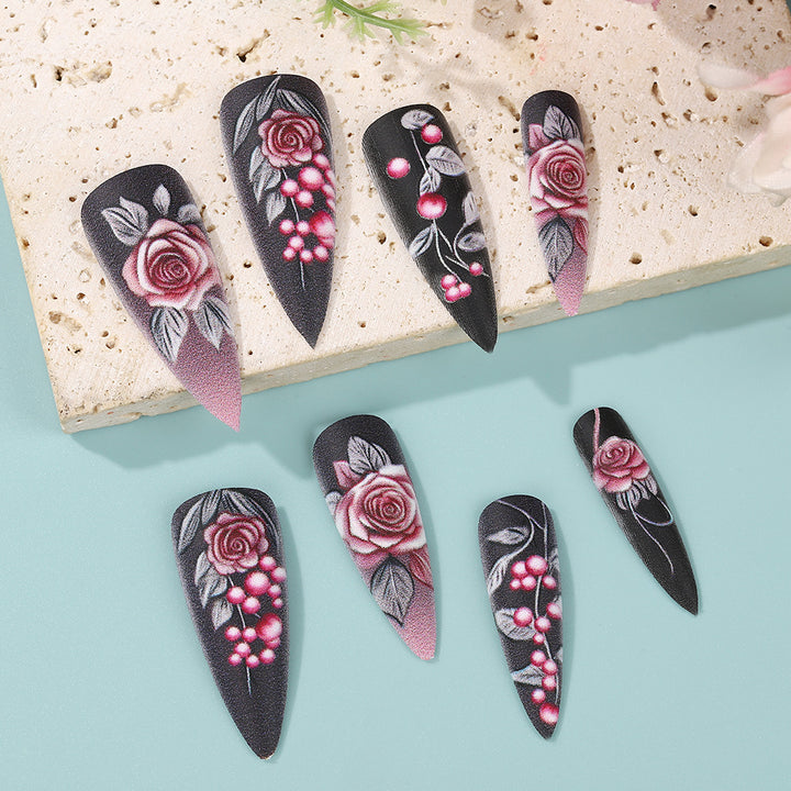 Kunstnägel mit detailliertem Rosendesign Karnz