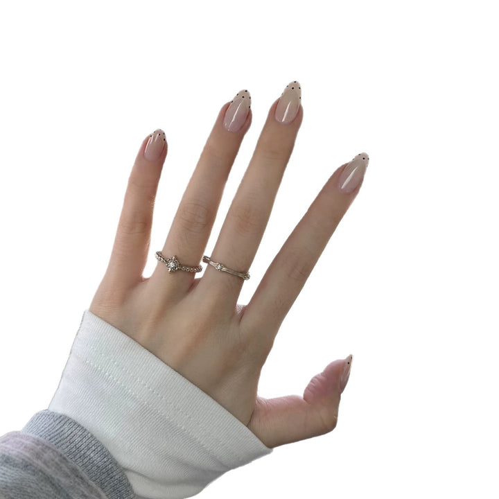 Elegantes kunstvolles Press-On-Nagel-Set mit gepunkteten French Tips