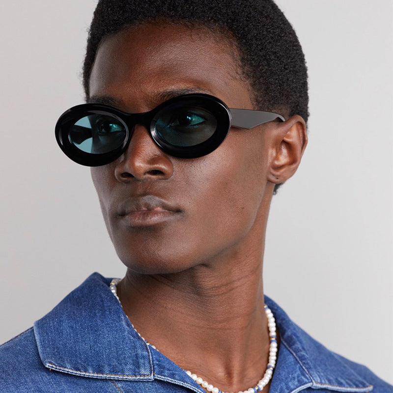 Damen modische ovalförmige Sonnenbrille mit innovativem Design Karnz