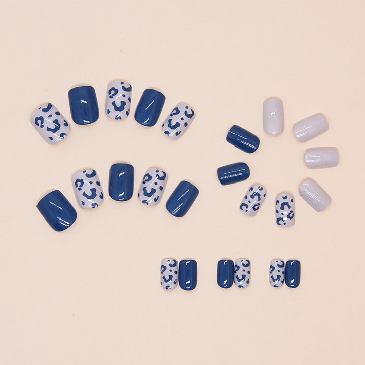 Künstlerische Leopardenmuster-Nagelkunst-Tipps Karnz