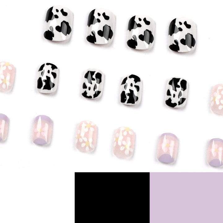 Kreative Nagelkunst mit Blumen- und Tiermotiven Karnz