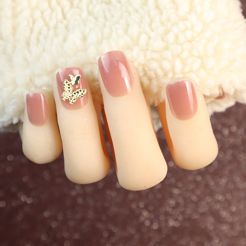 Elegantes Press-On-Nagelset mit Schmetterlingsakzenten