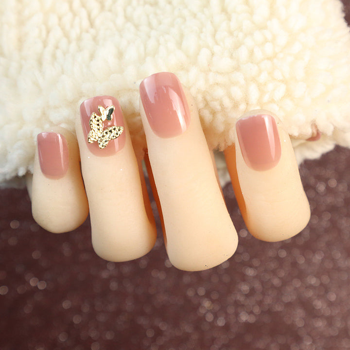 Elegantes Press-On-Nagelset mit Schmetterlingsakzenten
