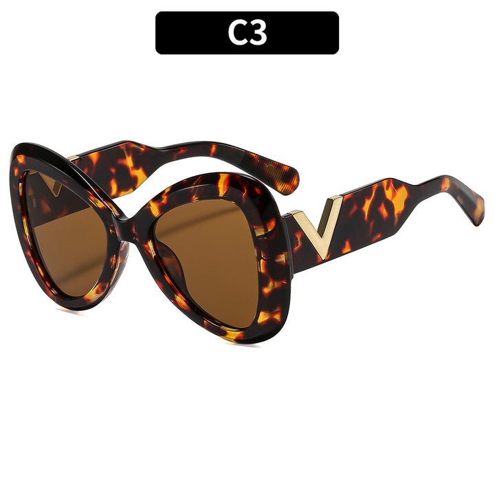 Elegante Cat-Eye-Sonnenbrille mit dekorativem Bügeldesign