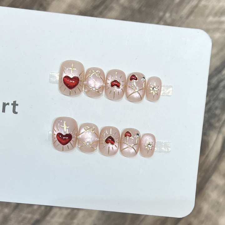 Künstlerisches Herz-Themen Press-On Nail Art Set Karnz