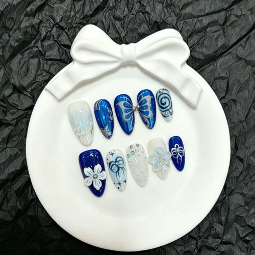 Dekorative Schmetterlings Press-On Nagelkunst Kollektion