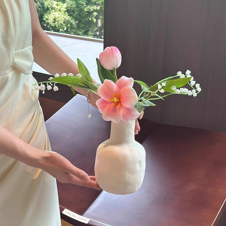 Dekorative künstliche Blumenarrangement