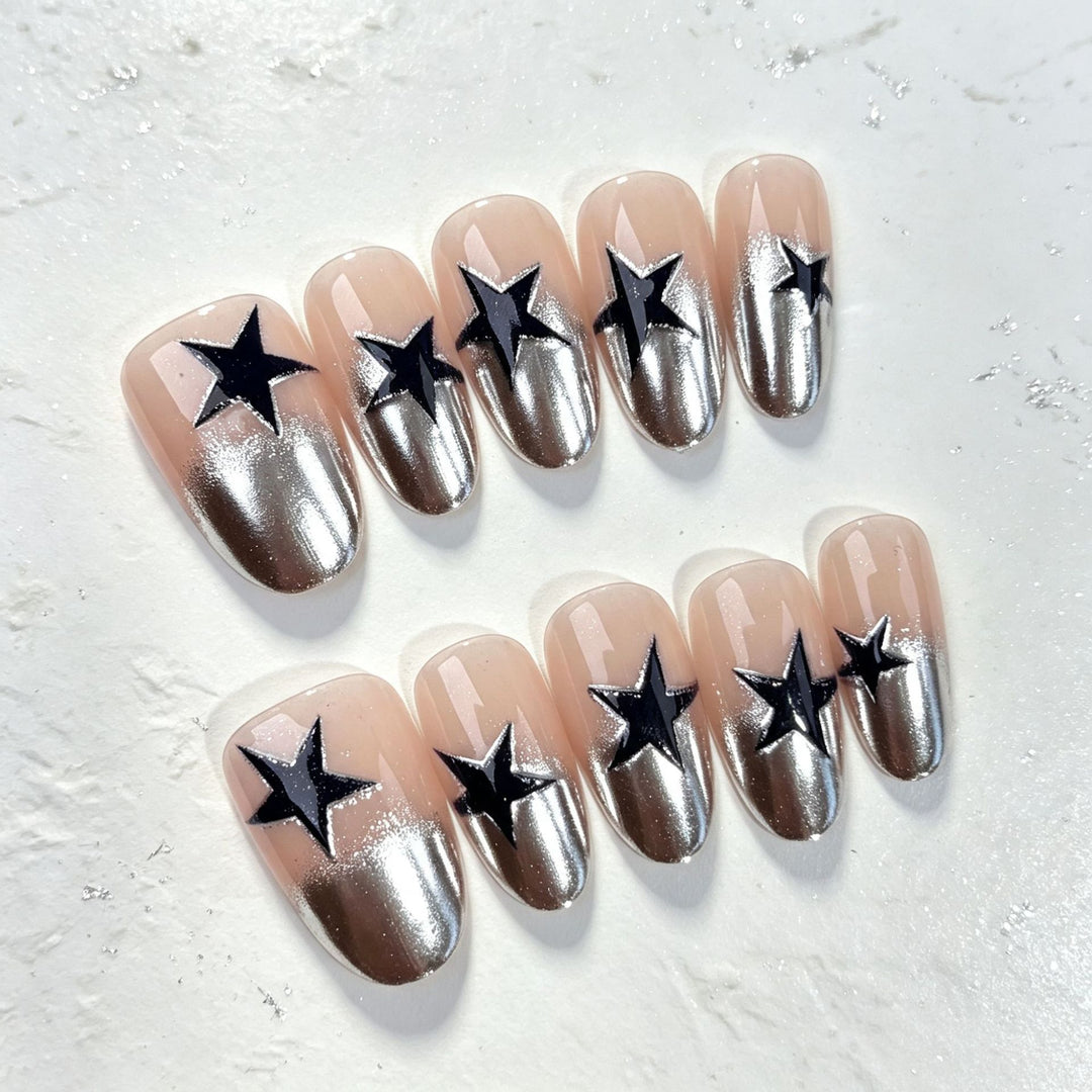 Elegante Sternmuster Press-On Nagelkunst