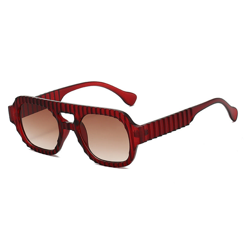 Damen modische Sonnenbrille im futuristischen Design mit strukturiertem Rahmen Karnz