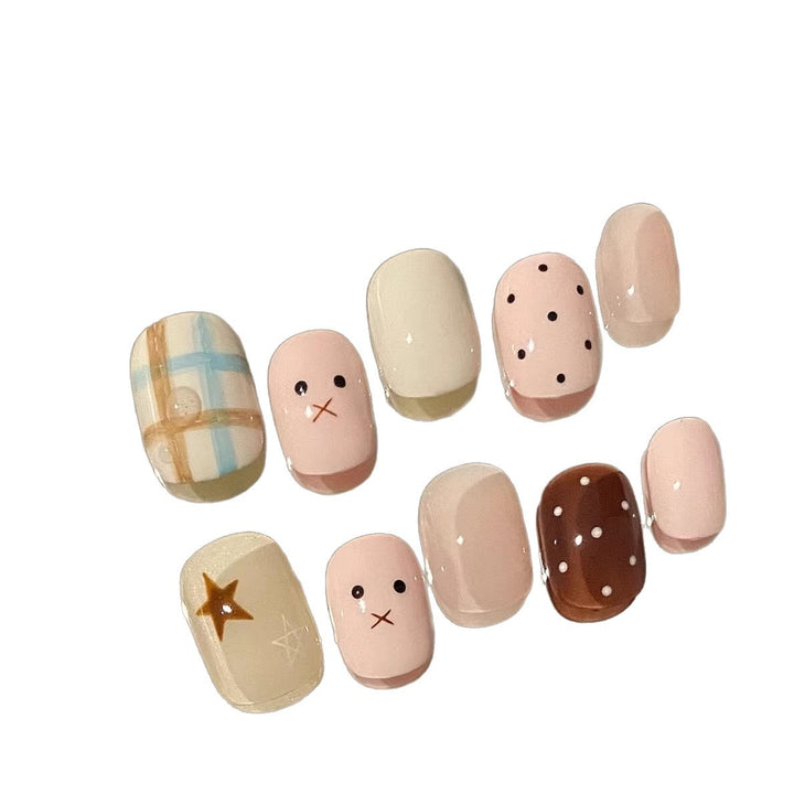 Künstlerisches Press-On Nagelkunstset mit verspielten Designs