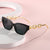 Damen modische Cat-Eye Sonnenbrille mit luxuriösem Kettenrahmen Karnz