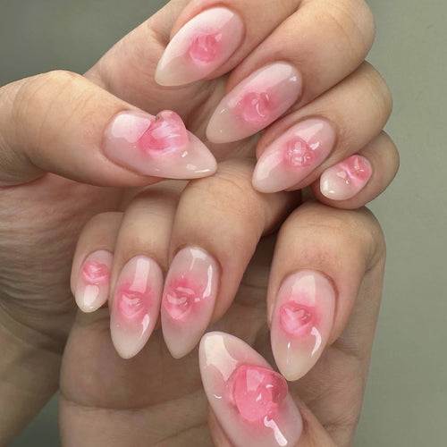 Kunstvolle Nagelverlängerungen mit Rosendesign Karnz