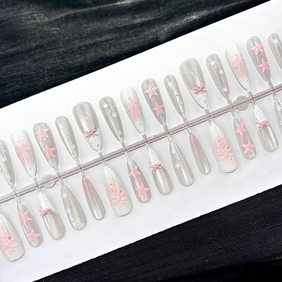 Dekorative Press-On Nagelkunst Set mit Sternen und Schleifen