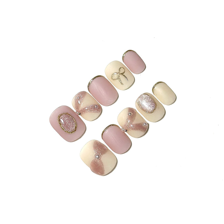 Elegantes Press-On Nagelkunst-Set mit Ripsband und Perlenakzenten