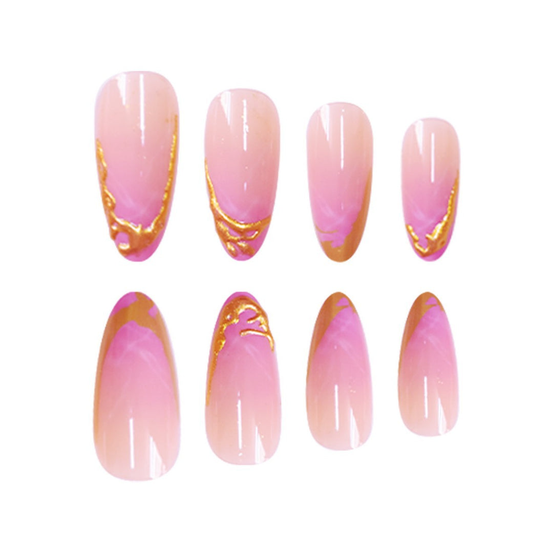 Elegante Stiletto Press-On Nagelverlängerungen mit Goldspitzen-Detail Karnz