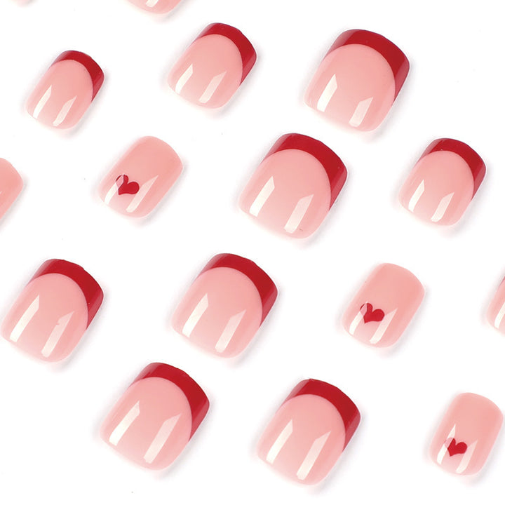 Künstlerisches Herzdesign Press-On Nagelset Karnz