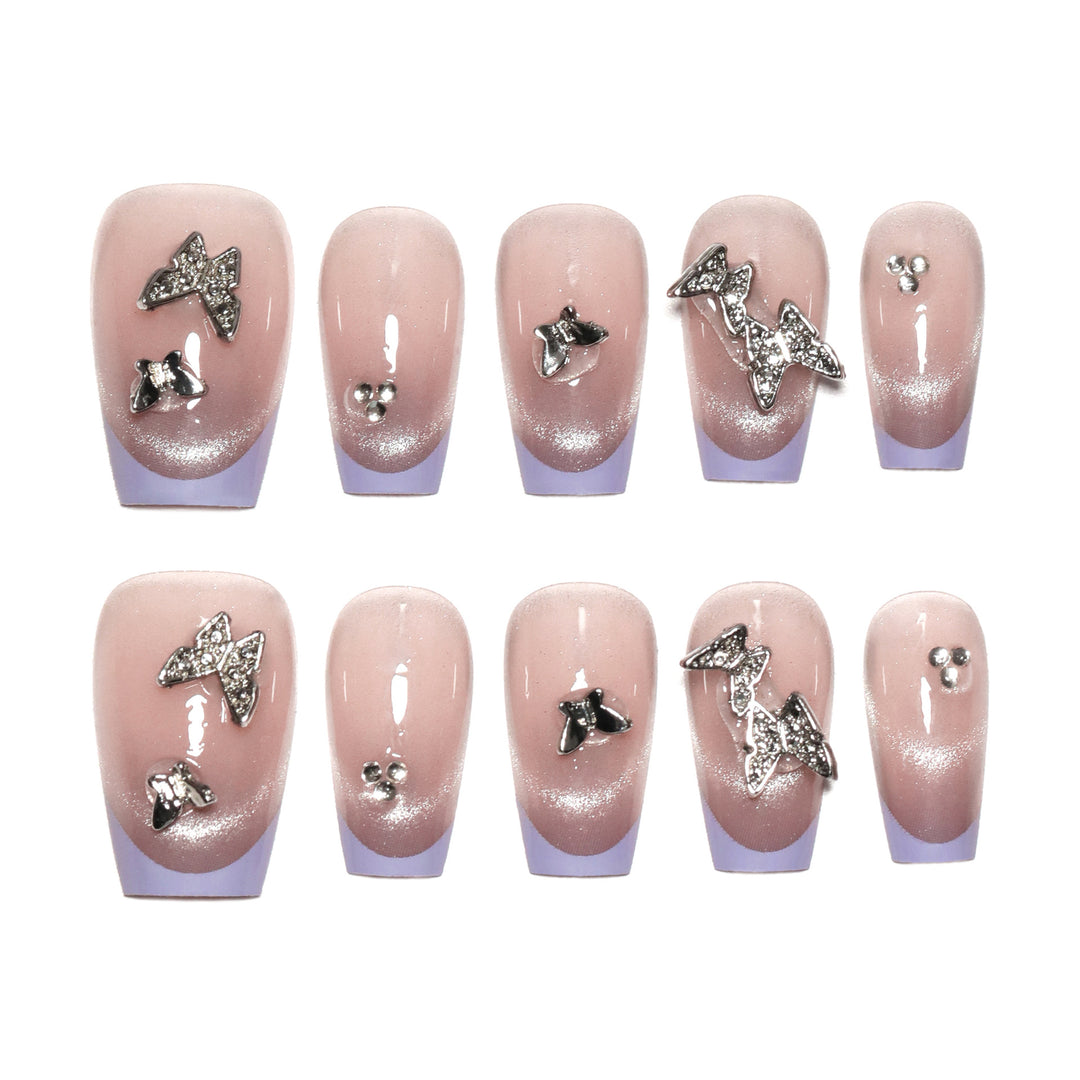 Künstliche Nagelverlängerungen mit Glitzerdesign und edlen Akzenten Karnz