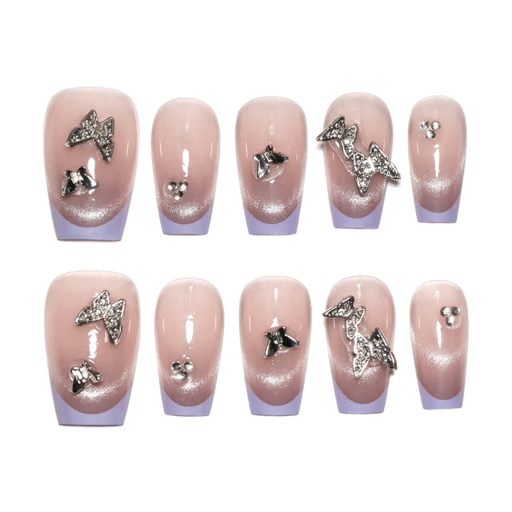 Künstliche Nagelverlängerungen mit Glitzerdesign und edlen Akzenten Karnz