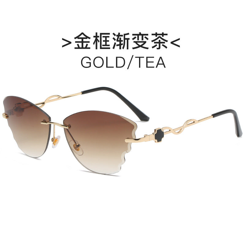 Damen extravagante Cat-Eye Sonnenbrille mit goldenen Akzenten Karnz