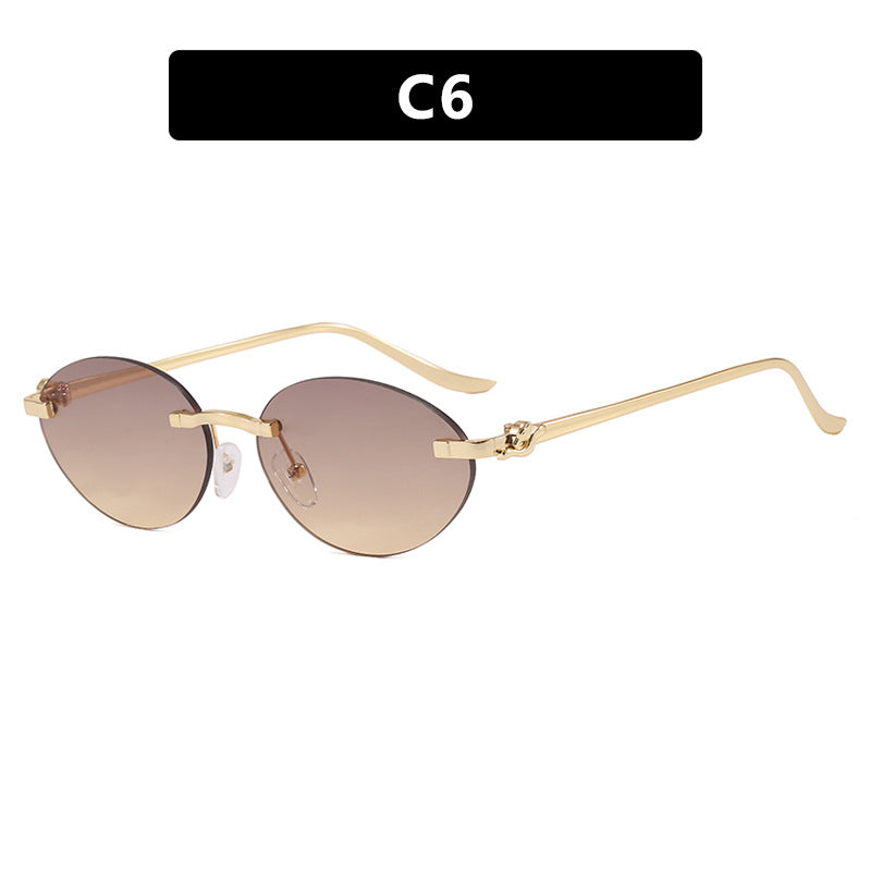 Damen elegante ovale Sonnenbrille mit goldenen Akzenten Karnz
