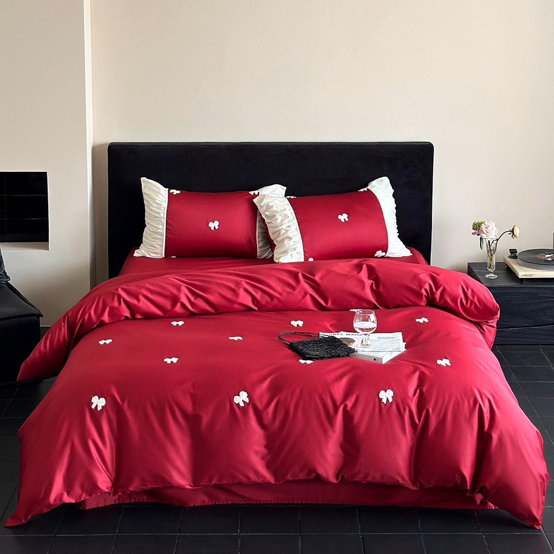 Luxuriöses Baumwollsatin-Bettwäsche-Set mit gestickten Schleifen und Rüschendetails