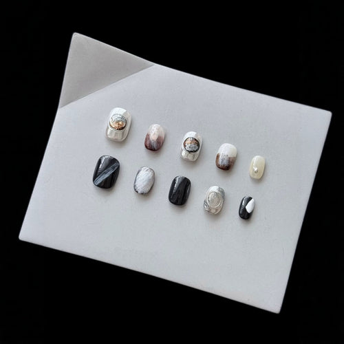 Künstlerisches Press-On Nagel-Set mit eleganten Designs