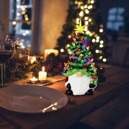 Weihnachtsmann Dekofigur mit Weihnachtsbaum Karnz