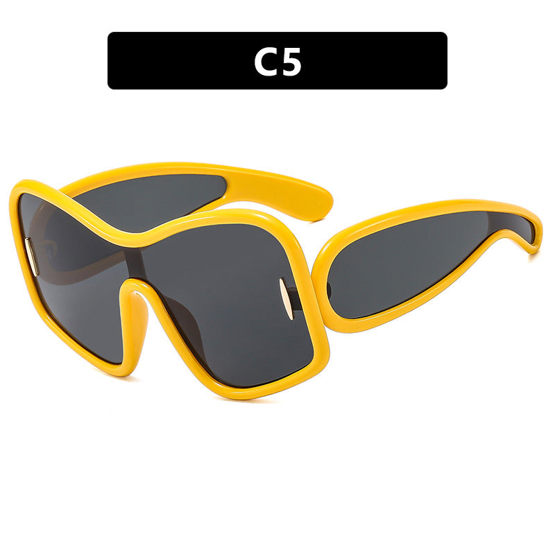 Damen futuristische Sonnenbrille mit extrabreitem Design und schützendem UV-Filter Karnz
