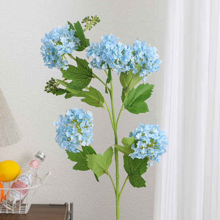 Künstlicher Hydrangeazweig mit lebhaften Blüten und detailreichen Blättern Karnz