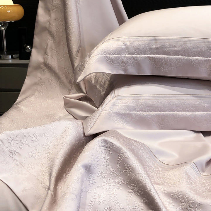 Jacquard floralgeprägte Baumwollsatin Bettwäsche Set mit geschwungenem besticktem Rand