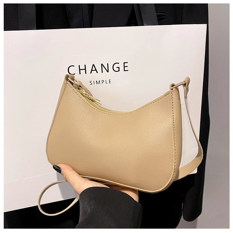 Elegante Handtasche Im Geschwungenen Design Karnz