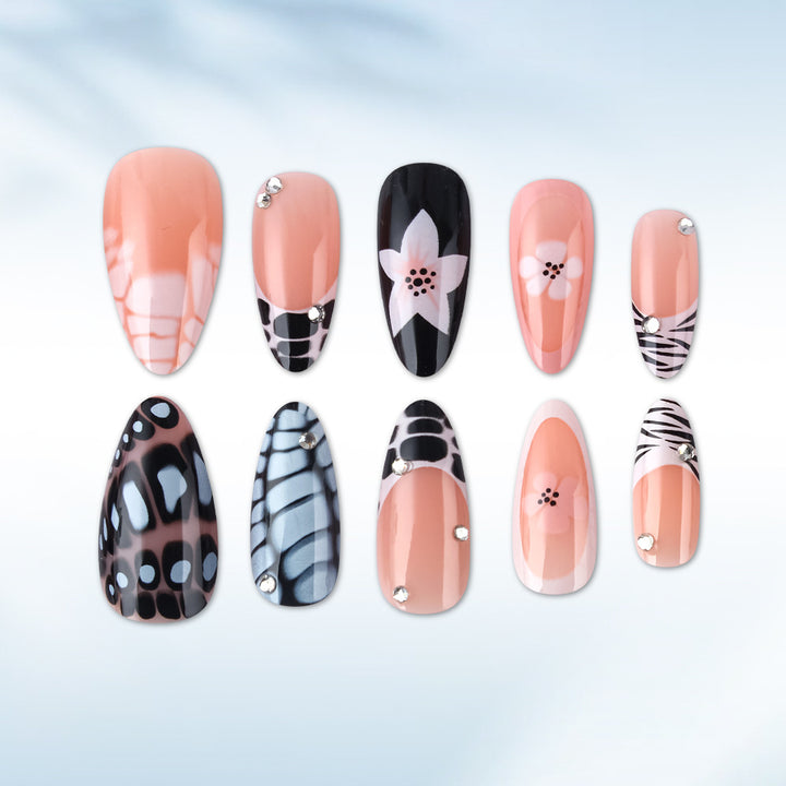 Künstlerisches Press-On Nagelset mit floralem und texturiertem Design Karnz