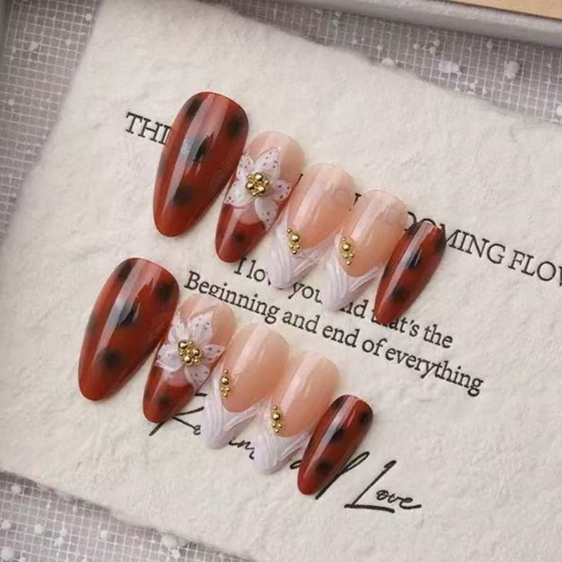 Künstlerisches Floral- und Stern-Applikationen Press-On Nagelset Karnz